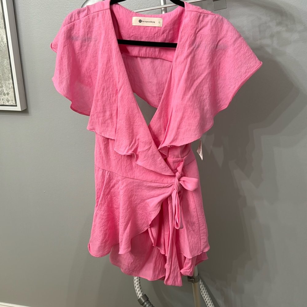 NWT Impeccable pink romper size L with open back